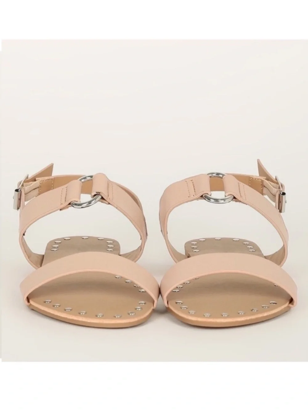 Nude leather studded metal ring accent slingback flat sandals